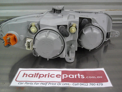 Holden V2/VY/CV8 Monaro Genuine Left Hand Headlight Reconditioned Used Part