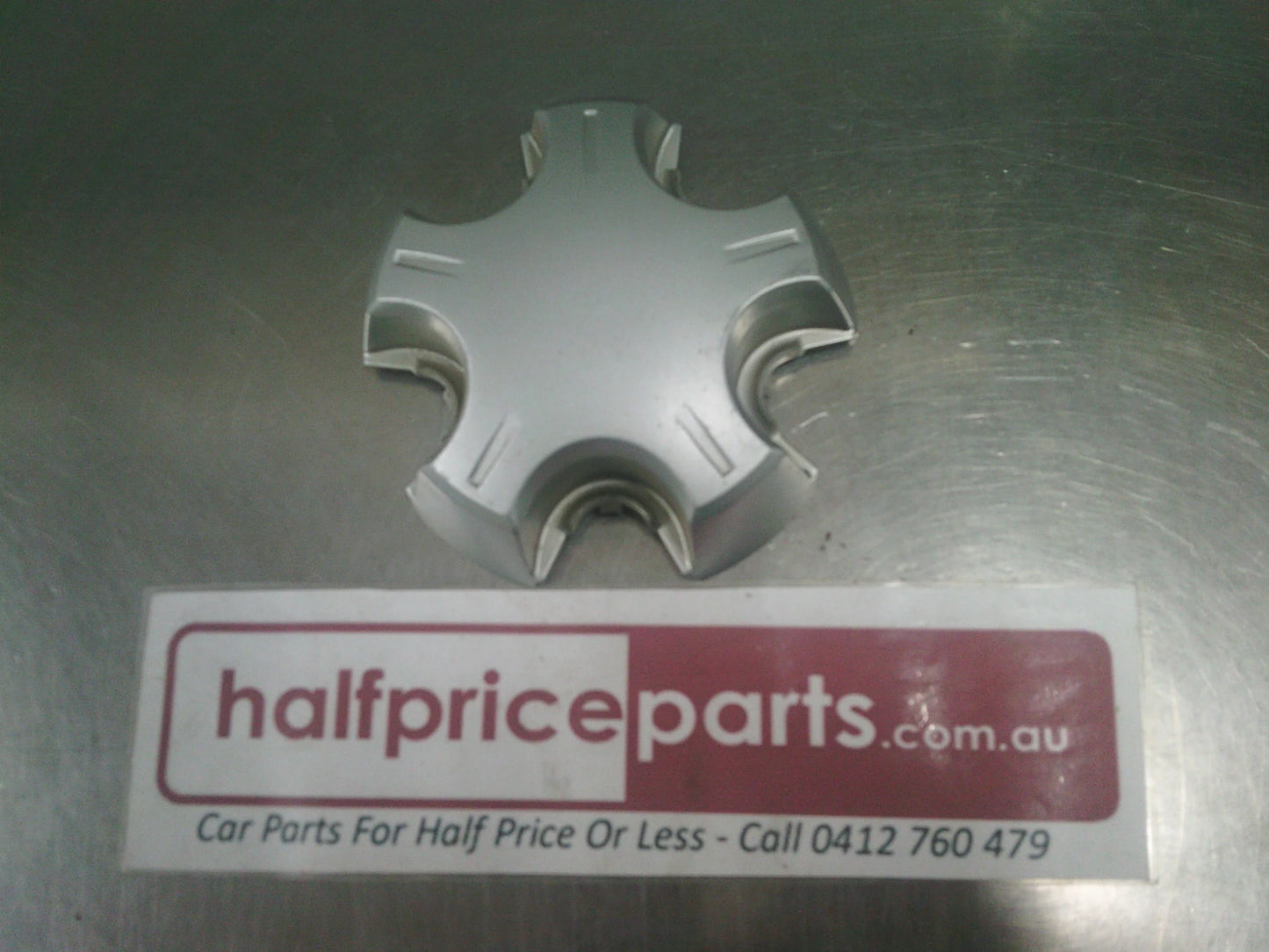 Holden VE Commodore Genuine Steel Wheel Centre Cap Used Part.