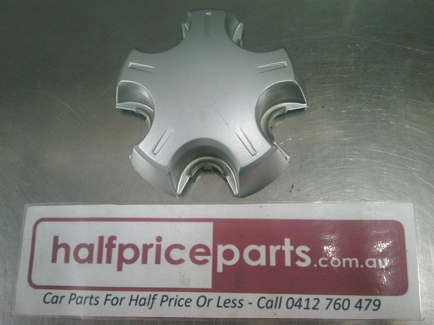Holden VE Commodore Genuine Steel Wheel Centre Cap Used Part.