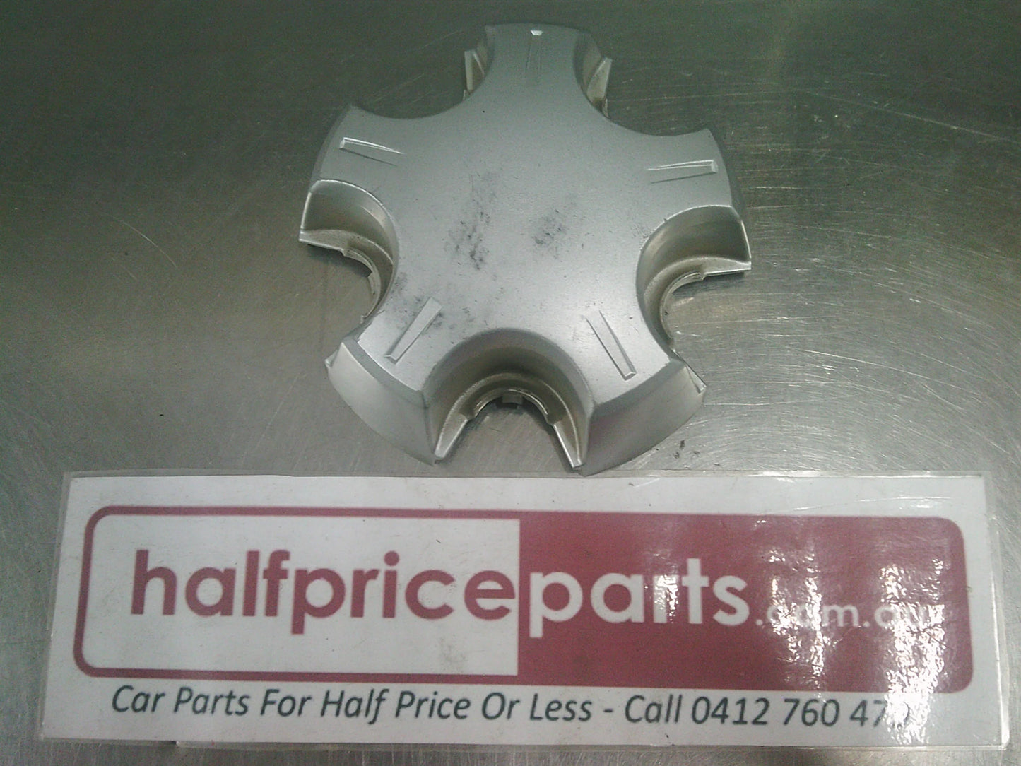 Holden VE Commodore Genuine Steel Wheel Centre Cap Used Part.