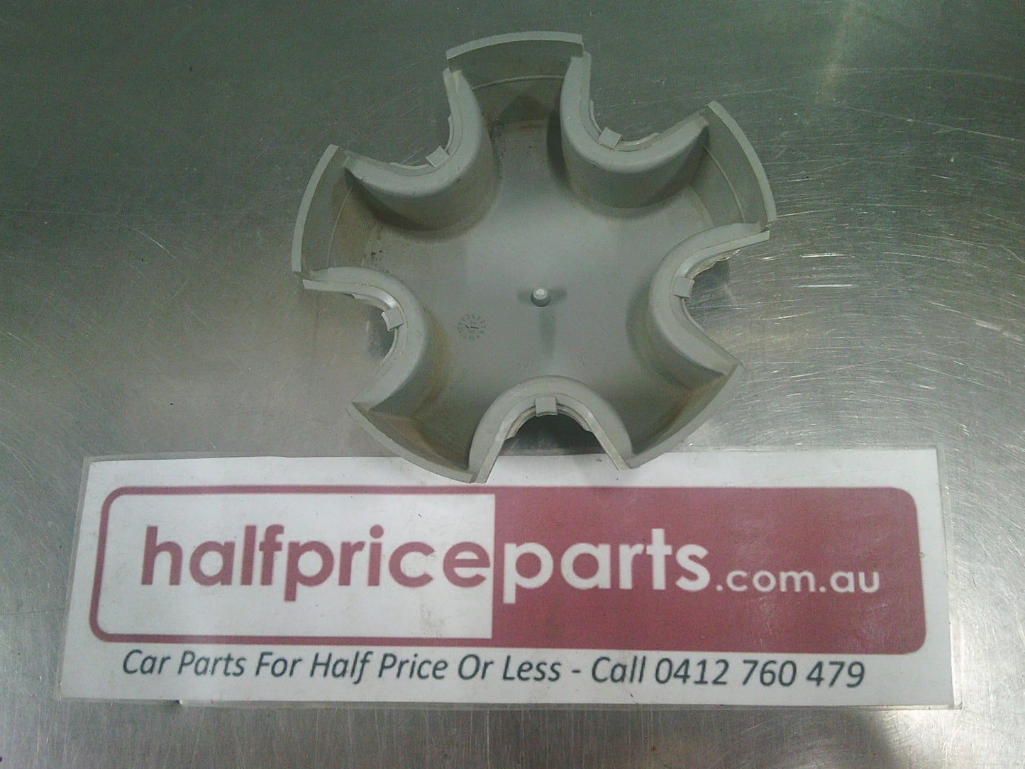 Holden VE Commodore Genuine Steel Wheel Centre Cap Used Part.