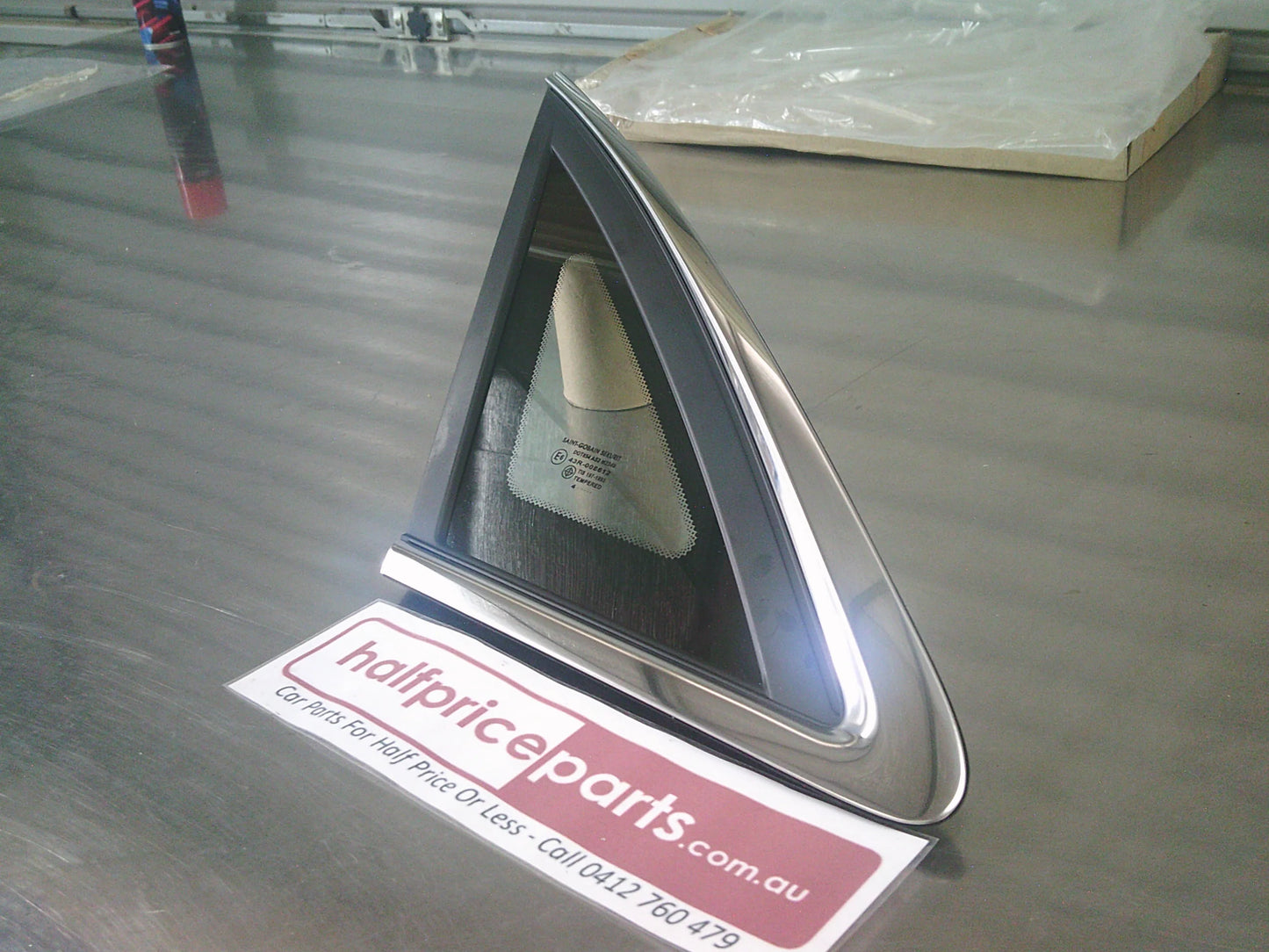 Holden WM/WN Caprice/Statesman/HSV Grange Genuine Left hand Rear Quarter Glass With Chrome Trim New Part