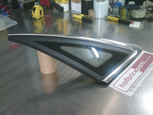 Holden WM/WN Caprice/Statesman/HSV Grange Genuine Left hand Rear Quarter Glass With Chrome Trim New Part