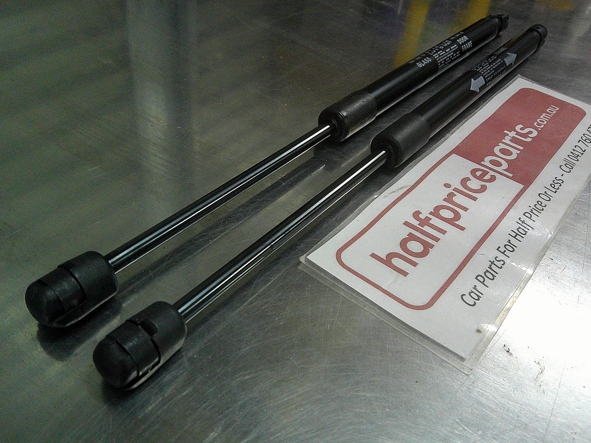 Toyota Hilux Genuine Rear Canopy Door Struts (Sold As Pair Only New Part