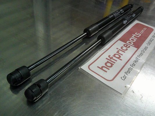 Toyota Hilux Genuine Rear Canopy Door Struts (Sold As Pair Only New Part