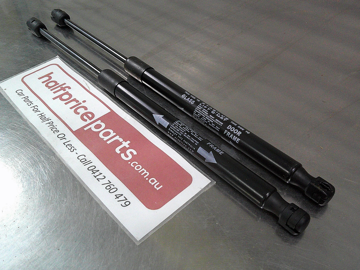 Toyota Hilux Genuine Rear Canopy Door Struts (Sold As Pair Only New Part
