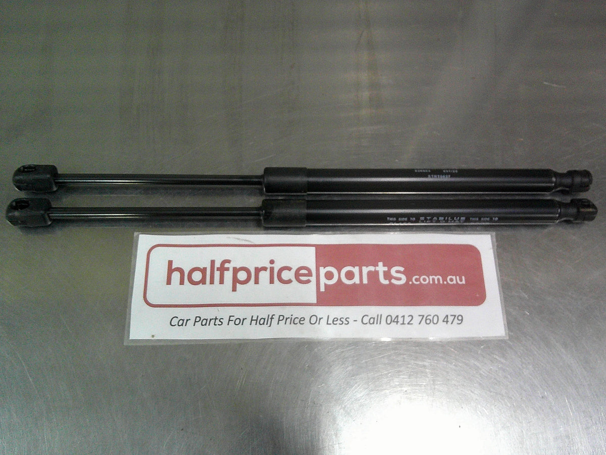 Toyota Hilux Genuine Rear Canopy Door Struts (Sold As Pair Only New Part