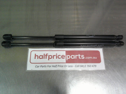 Toyota Hilux Genuine Rear Canopy Door Struts (Sold As Pair Only New Part
