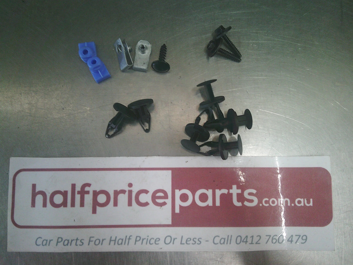 Holden JG/JH Cruze Genuine Rear Mud Flap Set With Fitting Kit New Part