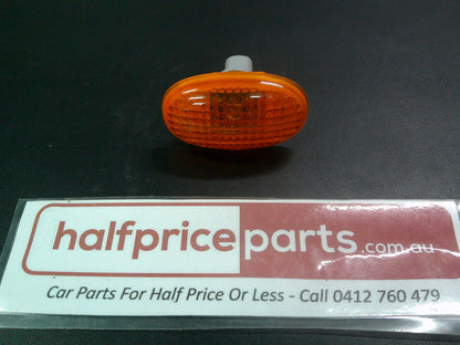 Holden Barina Spark Genuine Left/Right Hand Guard Indicator New Part