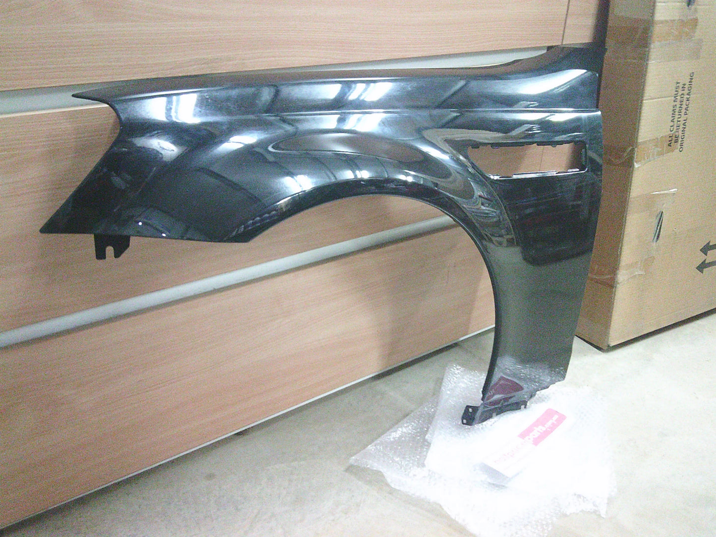 Holden VE Commodore SS/SV6 Genuine Left Hand Front Guard (Painted Factory Black) New Part