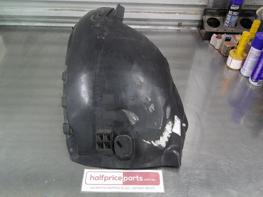 Holden AH Astra Genuine Left Hand Front Splash Guard (Rear Half) New Part.