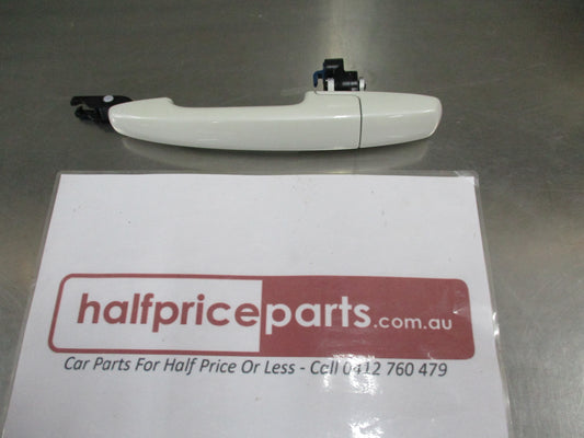 Suzuki Liana/Baleno Genuine Front Left White Door Handle (Passenger) New Part