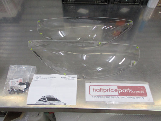 Hyundai Accent Genuine Headlight Protector Pair (With Fitting Kit) New Part