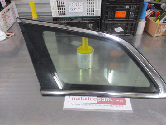 Mazda CX-7 Genuine Left Hand Quarter Glass With Chrome Trim New Part
