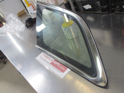 Mazda CX-7 Genuine Left Hand Quarter Glass With Chrome Trim New Part