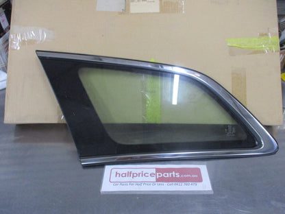 Mazda CX-7 Genuine Left Hand Quarter Glass With Chrome Trim New Part