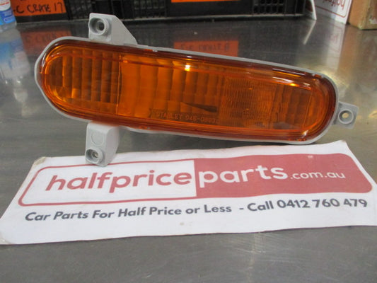 Ford Telstar AX Sedan Genuine Left Hand Front Bumper Bar Lamp New Part