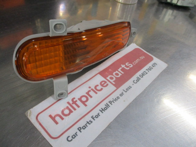 Ford Telstar AX Sedan Genuine Left Hand Front Bumper Bar Lamp New Part