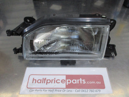 TYC Left Hand Front Head Light Assembly Suit Mazda 323 Sedan New Part