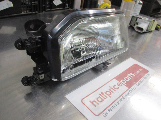 TYC Left Hand Front Head Light Assembly Suit Mazda 323 Sedan New Part