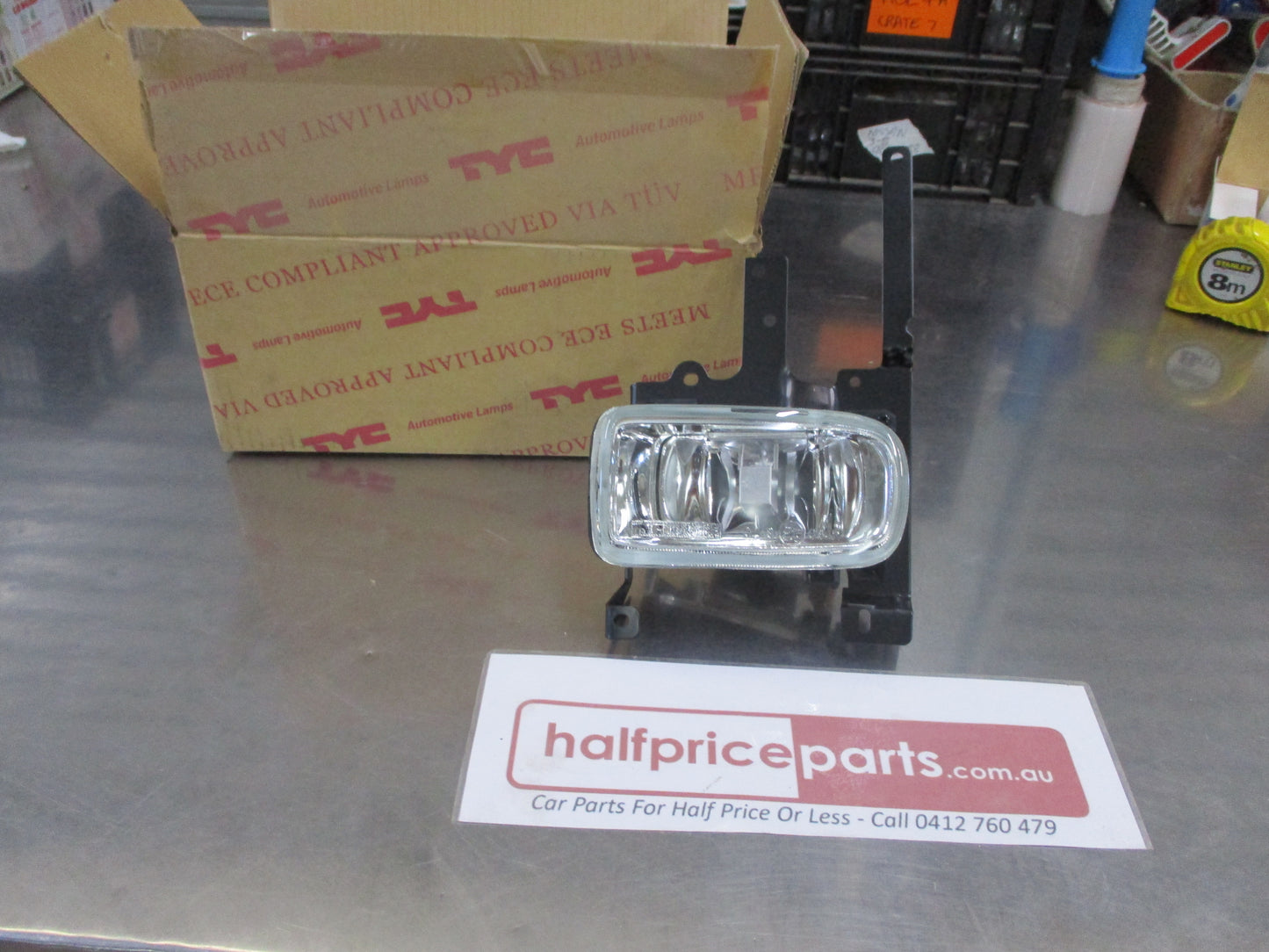 TYC Left Hand Fog Light With Mounting Frame Suits Mazda 323 Protege Sedan New Part