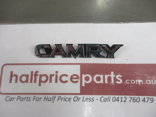 Toyota Camry Genuine Front Radiator Grille Chrome Emblem New Part