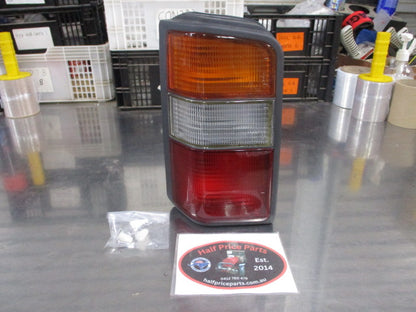 Mitsubishi L300/ Delica Genuine Left Hand Rear Tail Lamp Assembly New Part