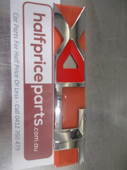 Ford PK Ranger XLT Genuine Chrome And Red Rear Tail Gate Emblem New Part