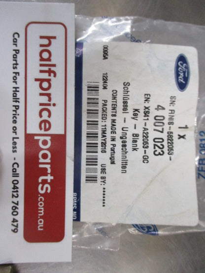 Ford LR Focus Genuine Key Transponder No Remote (Uncut)  New Part