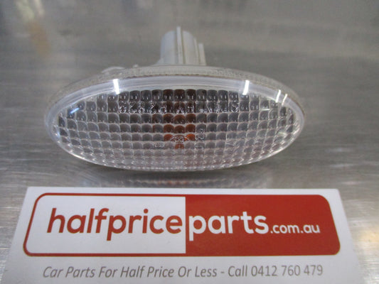 Mazda 2/3/6/BT-50 Genuine Front Wing Clear Side Indicator New Part