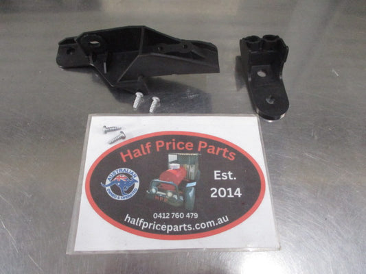 Mitsubishi Pajero Genuine left hand headlight brackets new part