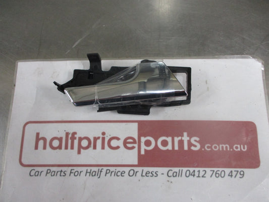 Holden TK Barina Genuine Drivers Front Door Inner Chrome Handle Assy New Part
