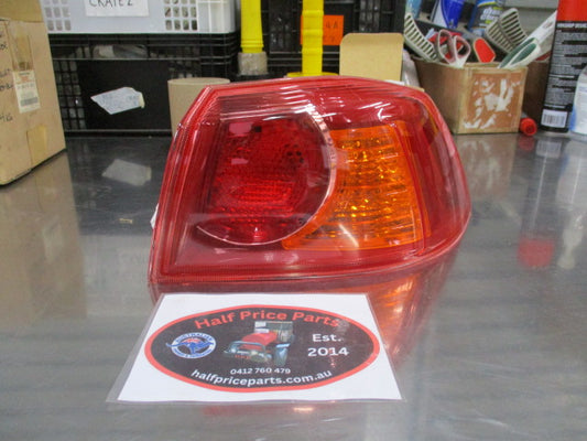 Mitsubishi Lancer Genuine Right Hand Rear Tail Light Assembly New Part