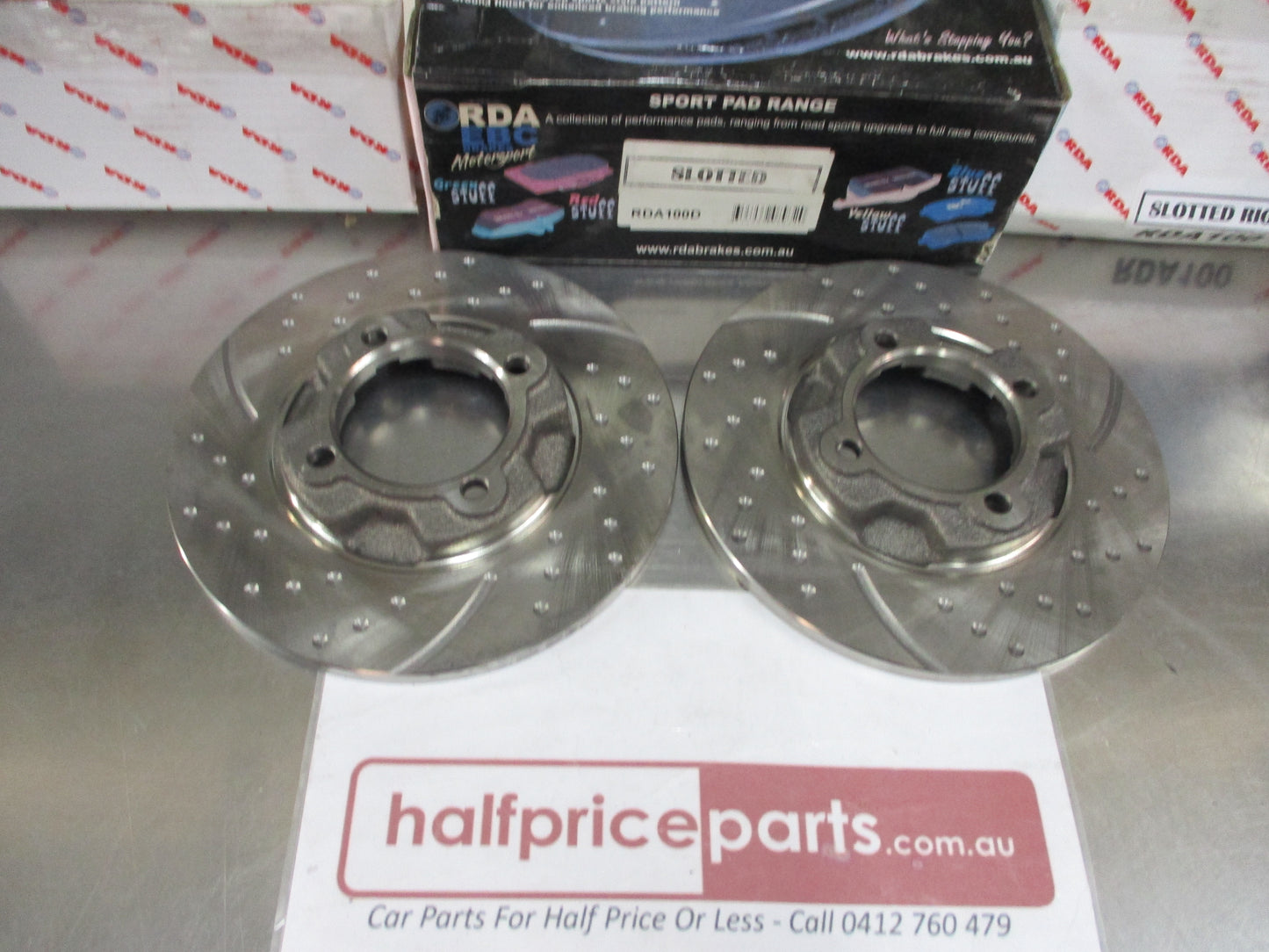 RDA Front Disc Rotors (Pair) Slotted-Dimpled Suits Mazda 323 New Part