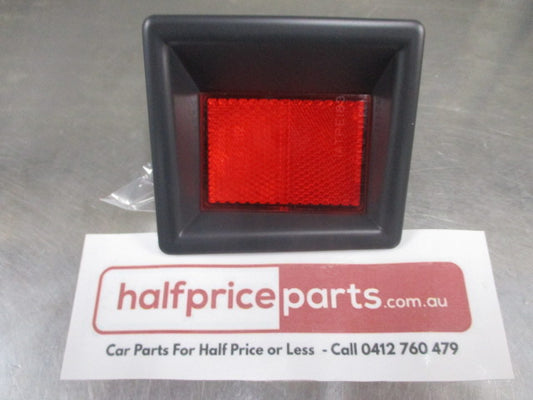 Mitsubishi Delica Genuine Left Hand Rear Bumper Reflector New Part