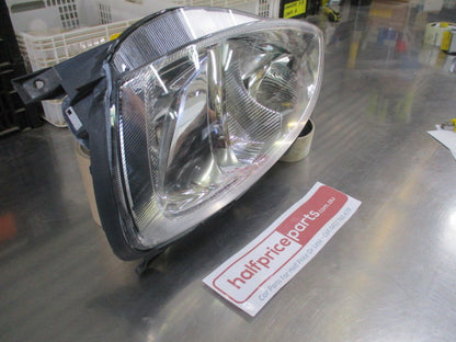 Holden XC Barina Genuine Lefthand Headlight -  New Part
