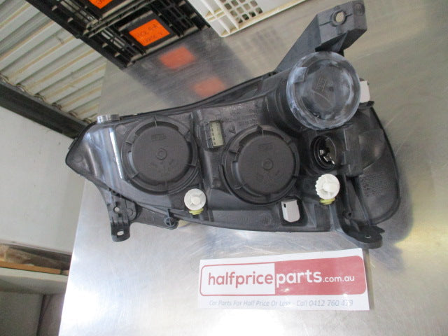 Holden XC Barina Genuine Lefthand Headlight -  New Part