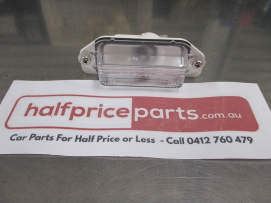 Mitsubishi EVO/ Lancer Genuine Rear License Plate Lamp Assembly New Part