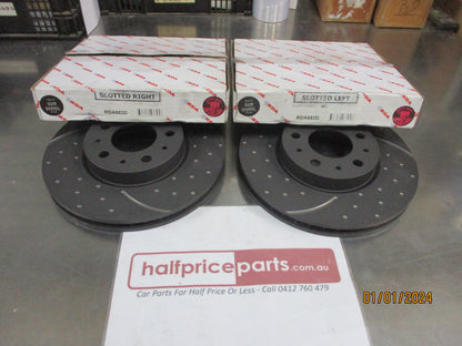 RDA Front Disc Rotors (Pair) Slotted-Dimpled Suits Volvo 850/C70/S70/V70/S New Part