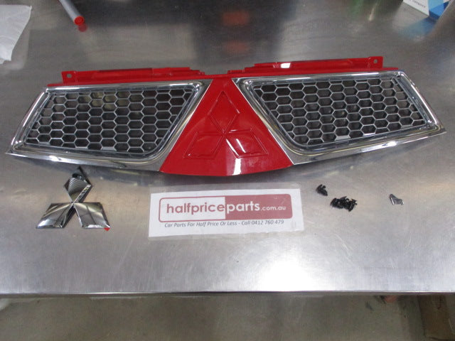 Mitsubishi Triton MN/ML Genuine Front Grille Kit With Chrome Emblem (Red) New Part