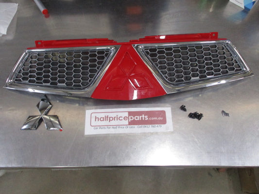 Mitsubishi Triton MN/ML Genuine Front Grille Kit With Chrome Emblem (Red) New Part