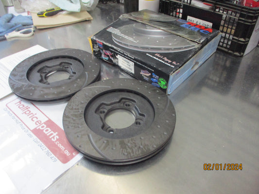 RDA Front Disc Rotor (Pair) Slotted-Dimpled Suit Mazda 323 BF 1.6Ltr Turbo/Ford Laser/TX3/TX3 Turbo/Capri New Part.