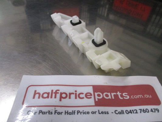 Mitsubishi Mirage Genuine Left Hand Rear Bumper Side Retainer Bracket New Part