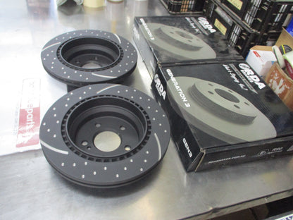 RDA Rear Disc Brake Rotors (Pair) Slotted-Dimpled Suits Mercedes Benz CLS-Class New Part