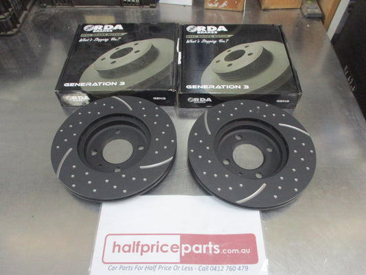 RDA Front Disc Brake Rotors (Pair) Slotted-Dimpled Suits VW Passat/Golf/Polo New Part
