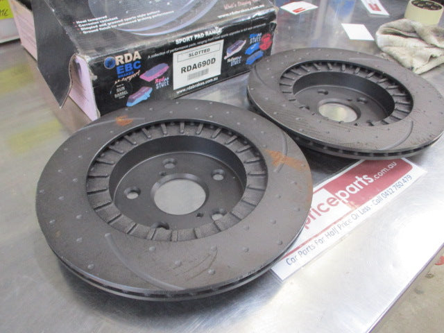 RDA Front Disc Brake Rotors (Pair LIGHT RUST ON SURFACE REDUCED PRICE) Slotted/Dimpled Suit Toyota Rav4 New Part