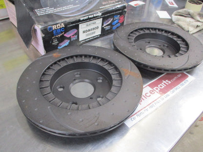 RDA Front Disc Brake Rotors (Pair LIGHT RUST ON SURFACE REDUCED PRICE) Slotted/Dimpled Suit Toyota Rav4 New Part