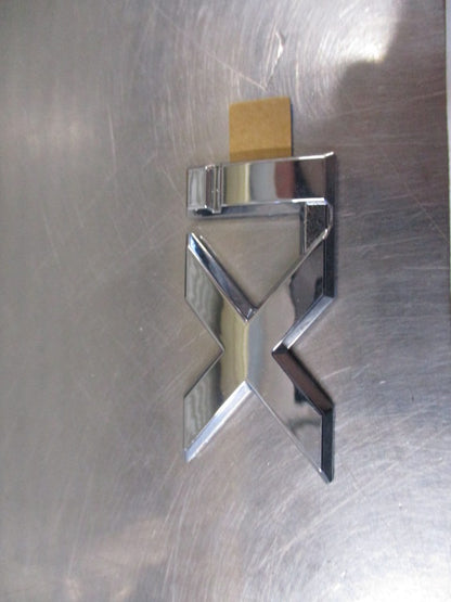 Mitsubishi Magna/Verada Genuine Chrome Xi Emblem New Part
