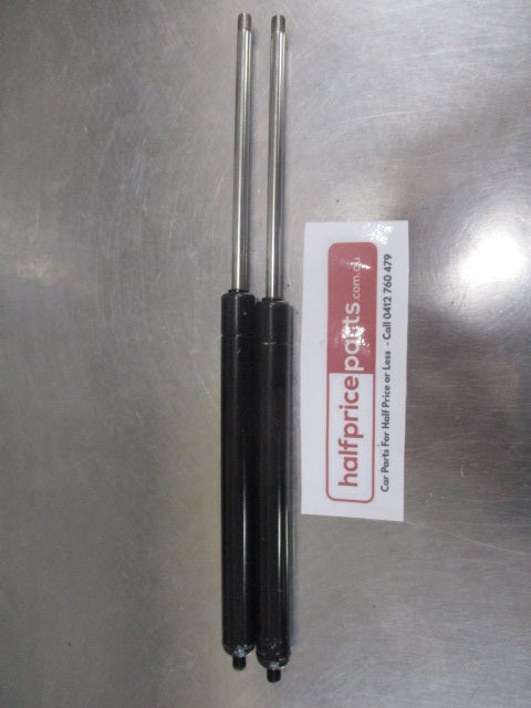 Mitsubishi ML Triton Genuine (Pair) Bonnet Gas Struts New Part